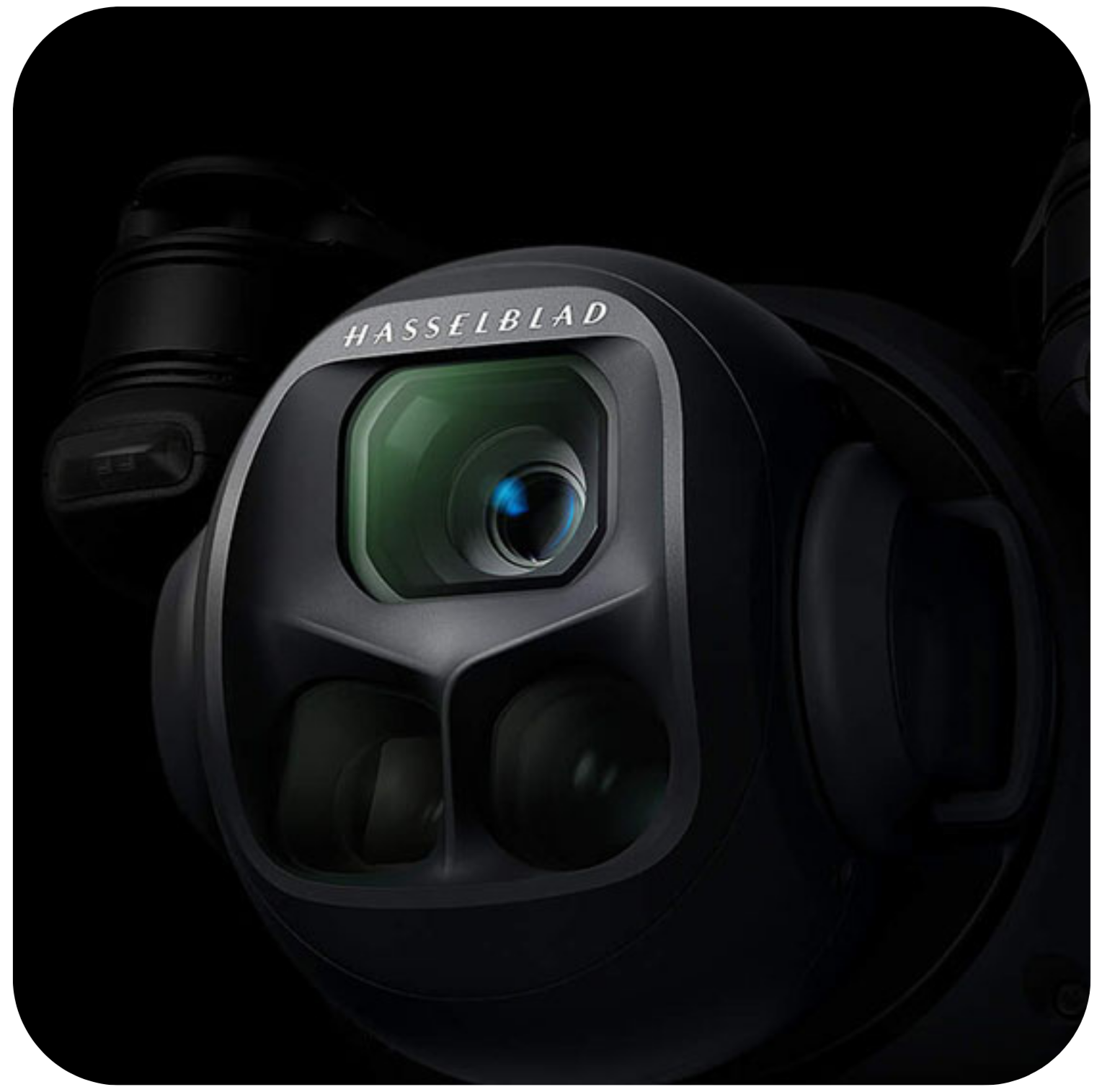 Camera lens with Hasselblad branding on a black background