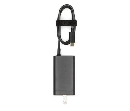 Black USB adapter with keychain on a white background