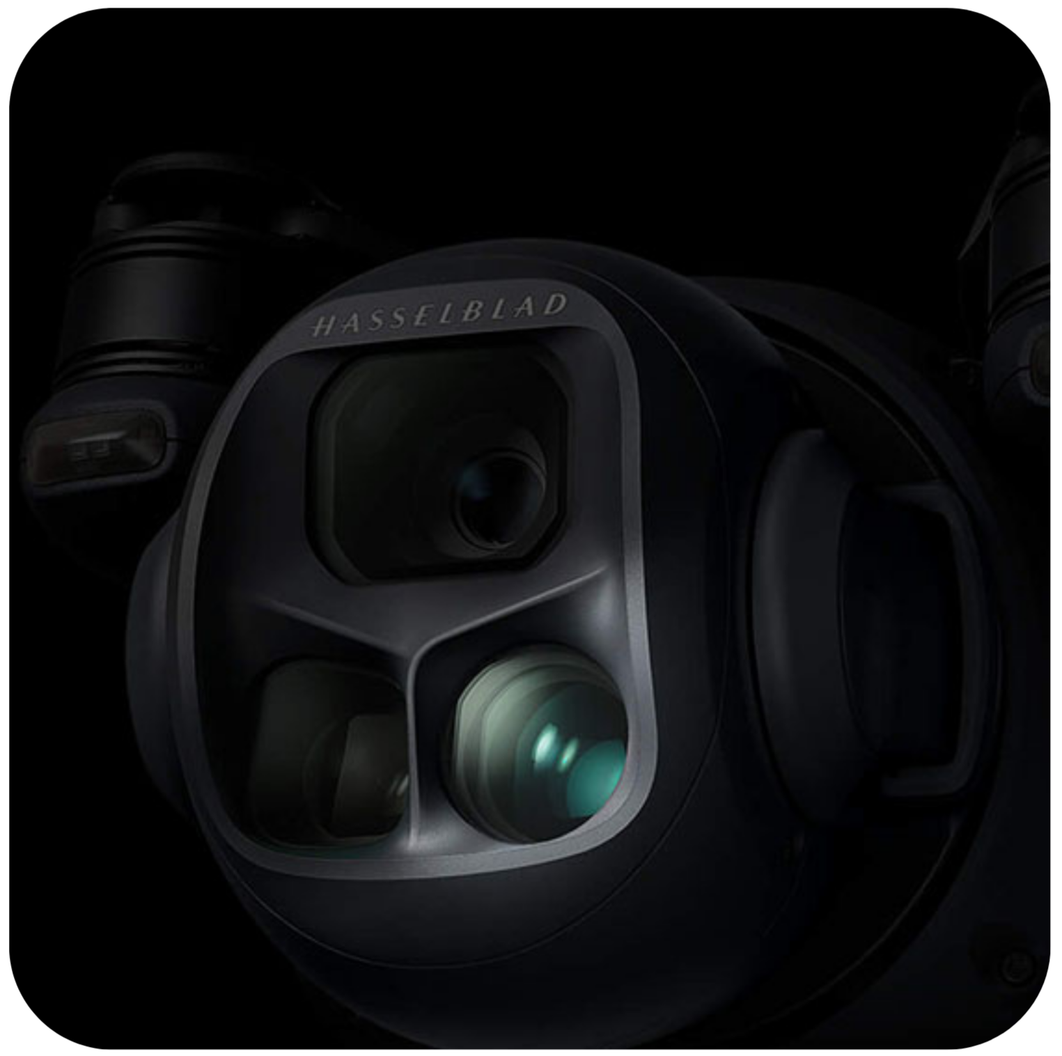 Close-up of a black camera lens with 'Leica' branding on a white background